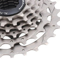 Close-up view of 6 speed bicycle cassette with low noise and smooth rotation, durable stainless steel and aluminum alloy gear set