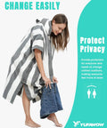 Woman using Hooded Surf Poncho Towel For On The Go Privacy Women Men Changing Robe With Front Kangaroo Pocket Beach Gear