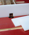 4 In X 48 In X 3/8 In UHMW Plastic Sheet on router table, showing smooth sliding surface and cutting board grade material
