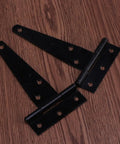 Dope 24 Pack Black T Shape Hinges 4 Inch Heavy Duty Iron Gate Hinges with 6 Pre Drilled Holes on wood background