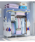 Portable Standing Clothes Wardrobe With Tool Free Setup And Hella Roomy Fabric Shelf Featuring Dual Side Pockets Plus Multiple Hanging Rods For Stress Free Closet Organization And Gear Storage with colorful clothes and luggage.