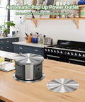 Pop Up Power Outlet Station With 3 AC Plugs And USB A Plus USB C on kitchen countertop, stainless steel, recessed ETL listed.