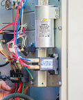 Air Conditioner Capacitor Replacement 70uF 370/440V Round installed in HVAC unit interior