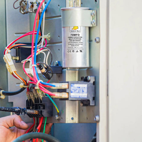 Air Conditioner Capacitor Replacement 70uF 370/440V Round installed in HVAC unit interior