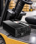 Heavy Duty 1500W Power Inverter 72V To 120V Pure Sine Wave for Golf Cart and EV Systems positioned on a forklift.