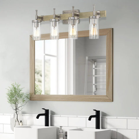 Winslow 28 Inch 4 Light Farmhouse Vanity Light With Seeded Glass Cylinder Shades Bleached Oak Finish in modern bathroom setting