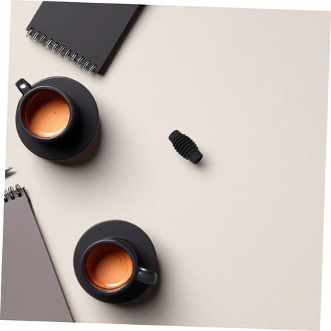 Espresso Machine Steam Wand Cover And Insulation Guard For Safe Burn Free Frothing on table with coffee cups