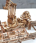 Rail Mounted Mechanical Claw Wooden Model Kit 3D Puzzle Assembly For Teens And Adults A Brain Teaser With Moving Levers On A Full Scale Rail Platform Detailed Construction Guide And Hands On Educational Fun, laser-cut plywood model