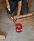 Getajghsd Iron Router Table Lifting System Base for Precision Slotting with red adjustable lift on workshop floor.