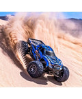 Blue Mini Maxx BL2S 4X4 Monster RC Truck with Brushless Power racing on sand
