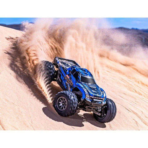 Blue Mini Maxx BL2S 4X4 Monster RC Truck with Brushless Power racing on sand
