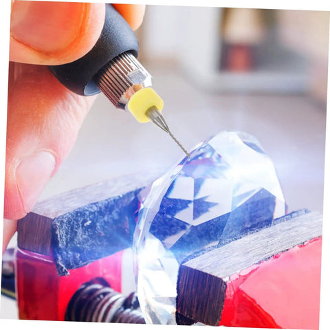 Using 30 Piece Tiny Drill Bits For Jewelry Making And PCB Engraving Tungsten Steel Micro Drill Bit Set on gemstone in vise