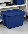Built Tough 18 Gallon Blue Plastic Storage Tote Bin Featuring A Secure Snap On Lid For Zero Hassle Home Organization And Reliable Gear Storage Year Round on a garage shelf.