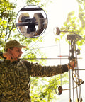 Archer using Capture Style Arrow Rest With Whisker Brush Biscuit For Compound And Recurve Bows in outdoor setting.