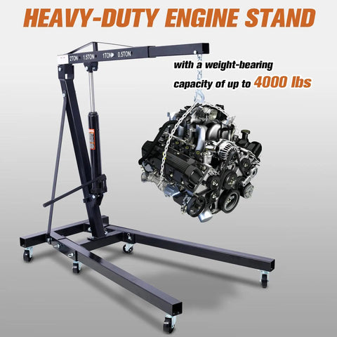 Rock Solid 2 Ton Folding Engine Hoist Cherry Picker Shop Crane Built For Hardcore Garage Swaps Featuring Hella Beefy Steel Frame And 4000 Lb Capacity lifting a car engine with a heavy-duty frame.
