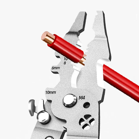 Close-up of Pro Grade Badass Heavy Duty Foldable Wire Stripper showing red wire and measurement markings for various gauge sizes.