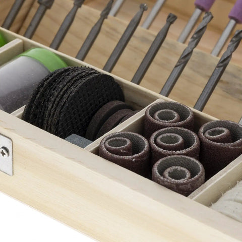 Close-up of 228 Piece Deluxe Universal Rotary Tool Accessory Kit For Sanding Polishing And Cutting Fits All Rotary Tools Including Dremel 1/8 Inch Shank Bands Fiber Cutoff Wheels Abrasive Wheels Wool Buffing Pads Aluminum Oxide Discs And More in wooden box