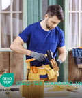 Man using mallet wearing General Purpose Nitrile Coated Work Gloves With Micro Foam Grip 48 Pairs Seamless Knit Breathable Nylon Black