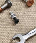Stainless Steel Reset Indexing Plunger With Knob And Self Locking Mechanism M10, shown with tools on fabric background.