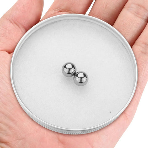Heavy Duty 2Pc Tungsten Carbide Bearing Balls 10MM Diameter G5 Precision Grade displayed in hand on white background.