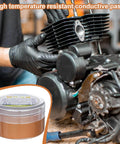 Electrical Grease Conductive Paste For Automotive And Electronics Copper Anti Seize Compound applied to engine component