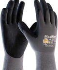 Ultimate Nylon Micro Foam Nitrile Grip Gloves For Heavy Duty Work Tough As Nails Breathable Powder Free Reusable Construction Gloves In Black And Gray 12 Pairs Per Pack For Construction And Industrial Use, showing palms and fingers with micro-foam grip in black and gray color.