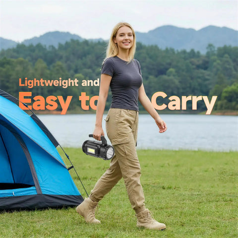 Person outdoors carrying Rechargeable All In One Camping Lantern And Flashlight With Built In Multi Tool Kit, Grab And Go 983 Lumen LED Spotlight, 9000 mAh Battery