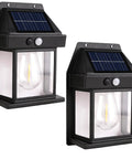 Heavy Duty Solar Wall Lights Outdoor Two Pack Weatherproof Security Sconces Motion Activated Floodlights with clear glass and black finish.