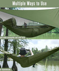 Durable Outdoor Camping Hammock with mosquito net and rain fly set up by a lake, made from heavy-duty parachute nylon.