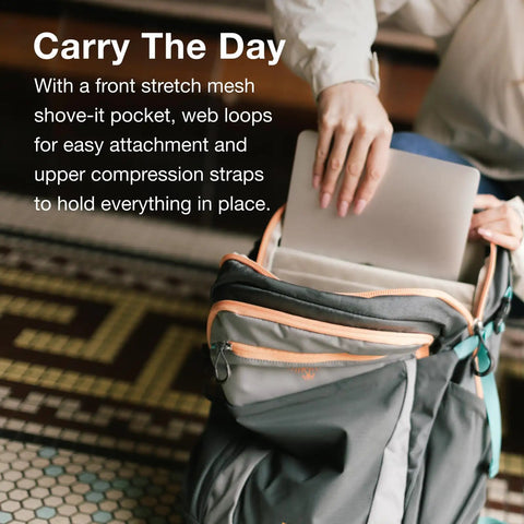 Person placing laptop in Urban Commuter Laptop Backpack With 16 Inch Laptop Sleeve AirScape Backpanel Front Organizer Stretch Pocket And Blinky Light Attachment For Campus And City Commutes