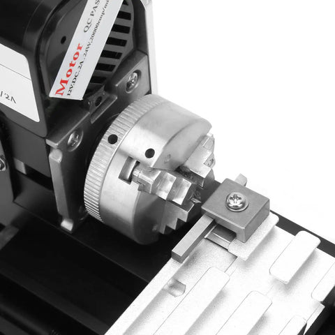 Close-up of Compact 20mm Mini Metal Lathe With High Precision 24W Motor showing spindle and milling detail.
