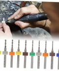 30 Piece Tungsten PCB Drill Bit Set for Hand Drill and Jewelry Making, precision tools held and used for crafting.