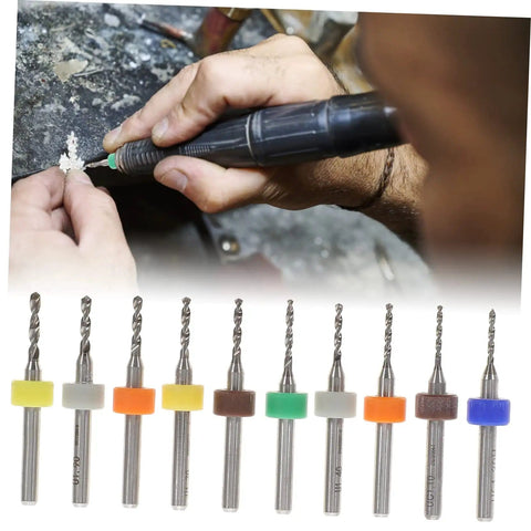 30 Piece Tungsten PCB Drill Bit Set for Hand Drill and Jewelry Making, precision tools held and used for crafting.