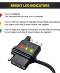 4 Way Flat Trailer Wiring Tester With Bright LED Indicators, Dual End 4 Pin Male And Female Connector, Easy Turn Signal And Tail Light Diagnostics, No Guesswork Troubleshooter For Hauling. Close-up of 4-pin flat trailer wiring tester with lit LEDs.