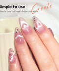 Cat Eye Nail Magnet Set 10pc with 3 In 1 Magnetic Pen creating heart and swirl designs on nails