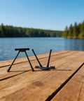Hella Solid Folding Replacement Table Legs With Adjustable Height Support Stand For Outdoor Camping And Backyard Hangouts on wooden dock by lake.