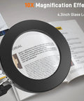 10X Magnifying LED Lamp With Optical Glass Lens 4.3 Inch Clamp On Craft Light highlighting text on an open magazine