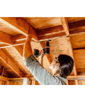 Compact 1/2 Inch 20V Cordless Drill Driver Featuring Brushless Motor And Adjustable Torque Settings used for ceiling framing work.