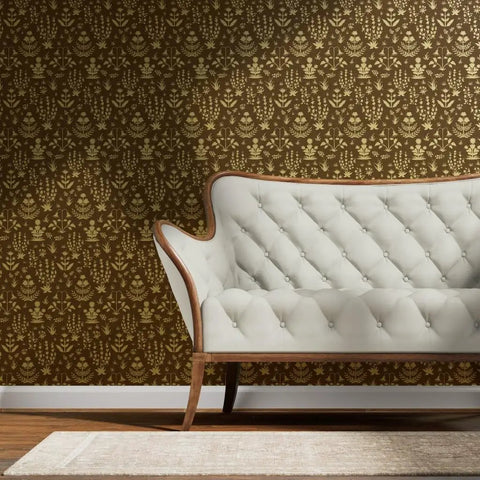 Top Tier Brown Floral Wallpaper With Shimmering Metallic Gold Foil Texture Easy Apply Ready To Hang behind a stylish sofa.