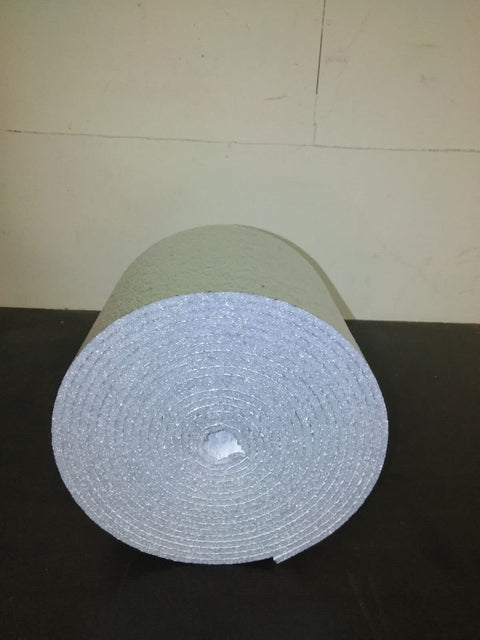 Roll of Foil Insulation Spiral Duct Wrap With Foam Core 8 Inch By 10 Foot R8 For HVAC Ducts, side view on black surface