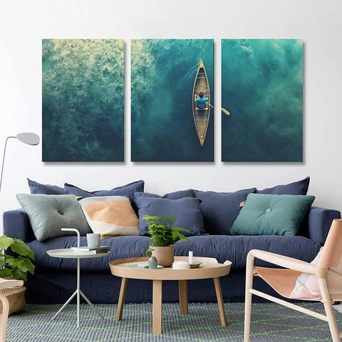 Teal Ocean Canoe Wall Art Canvas Print for Living Room with Modern Aesthetic Seascape and Floral Touch, Serene Natural Scene.