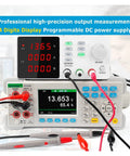 Close-up of 4-digit display Programmable DC Power Supply with USB output for PCB repair, battery charging, and lab experiments.