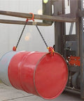 Heavy Duty 2200 Lbs Vertical Drum Lifter With Double Chains For Metal Barrels lifting red and gray steel barrels with a forklift.