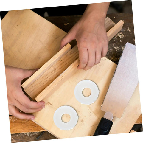 No Sweat Two Sets Grinding Wheel Diameter Sleeves Plastic Bushing Adapter Kit For Bench Grinder on wooden workbench.