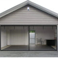 Garage Screen Door For 2 Car Garage 16x8 Feet Magnetic Closure Heavy Duty Screen installed on grey garage with open doors, black mesh visible