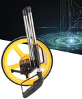 Tyenaza Mechanical Range Measuring Wheel 9999ft 10cm Accuracy Distance Measuring Roller with yellow wheel and retractable handle.