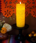 Encanto Alma's Miracle LED Flameless Candle Replica With Auto Timer Disney Officially Licensed Collectible Mood Light displayed on a table with flowers and decor.
