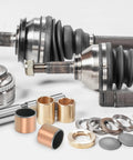 Front view of uxcell sleeve bearings: three 1 in bore copper bushings with washers beside a drive shaft.