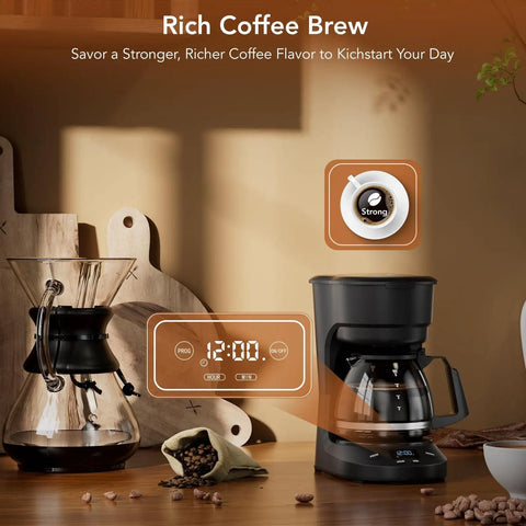 Compact 5 Cup Drip Coffee Maker With Programmable Timer, shown on a kitchen counter with coffee beans and cutting boards.