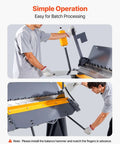 Man operating 48 Inch Heavy Duty Box And Pan Brake For Metalworking, showing 12 Gauge Mild Steel Capacity and adjustable bending angle.